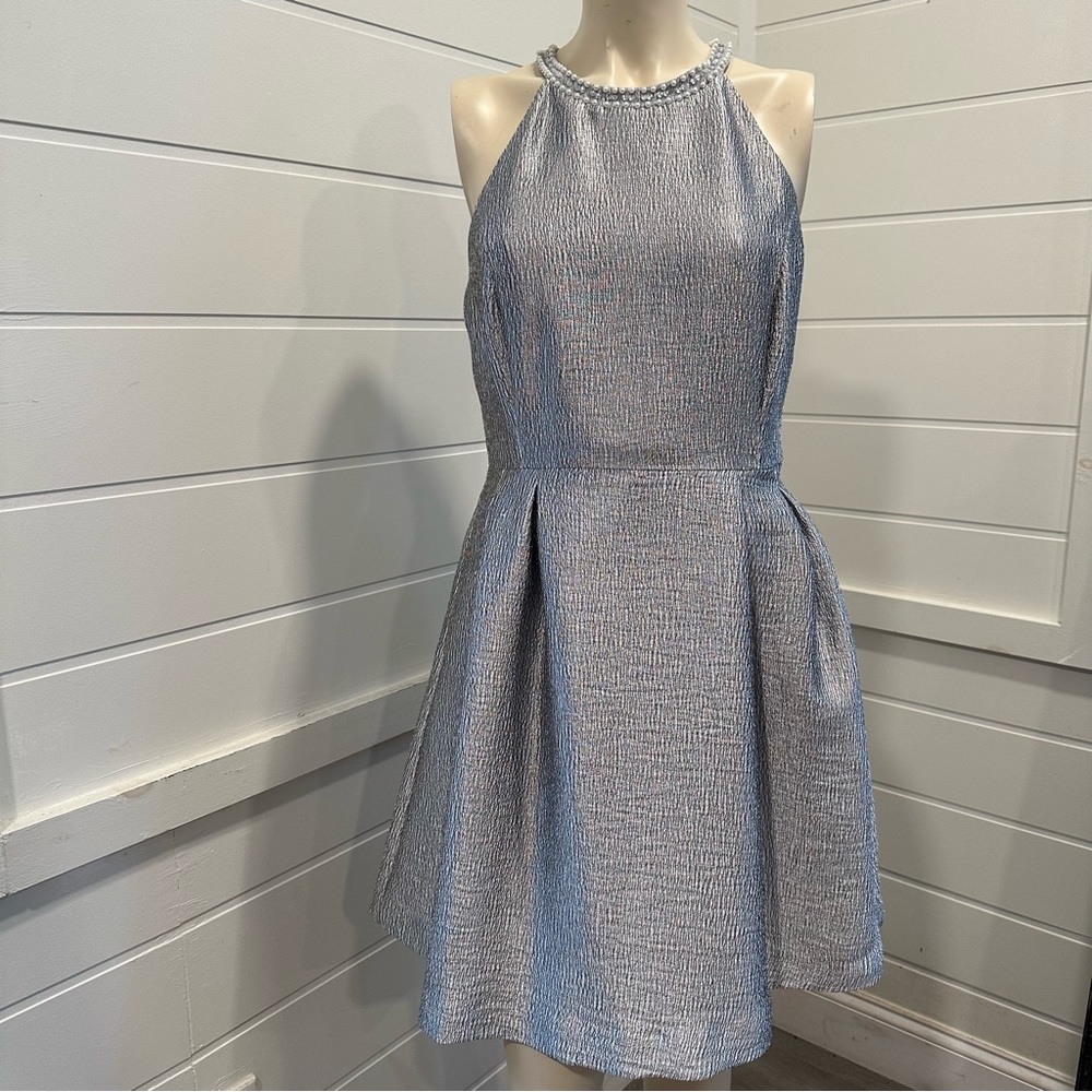 Jennifer Lopez silver halter dress with pearl accents